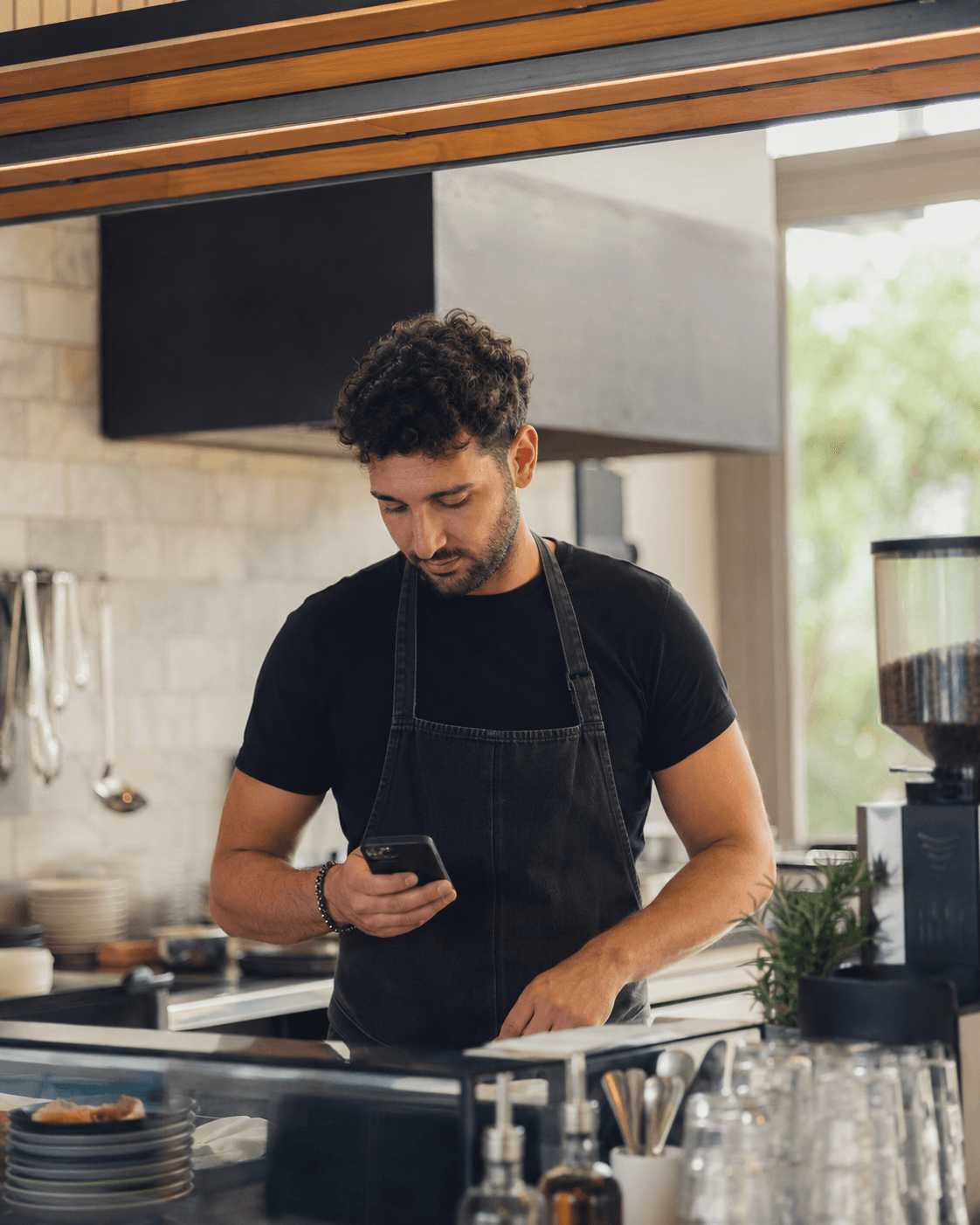 A café owner managing his space with Houny Business